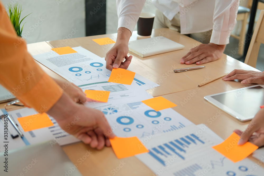 business people discussing on performance revenue in meeting. businesswoman working with businessman. business people discussing on performance revenue in meeting. businesswoman working with businessman.
