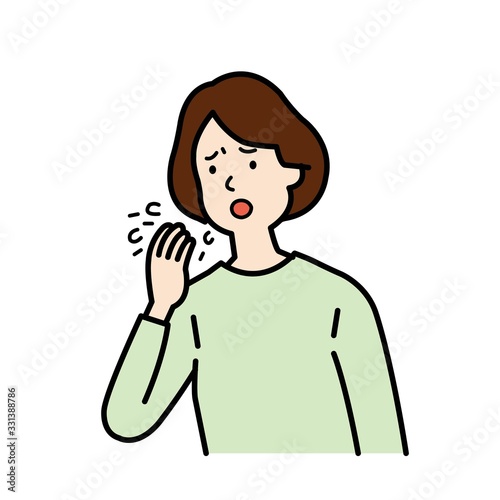 咳をする女性