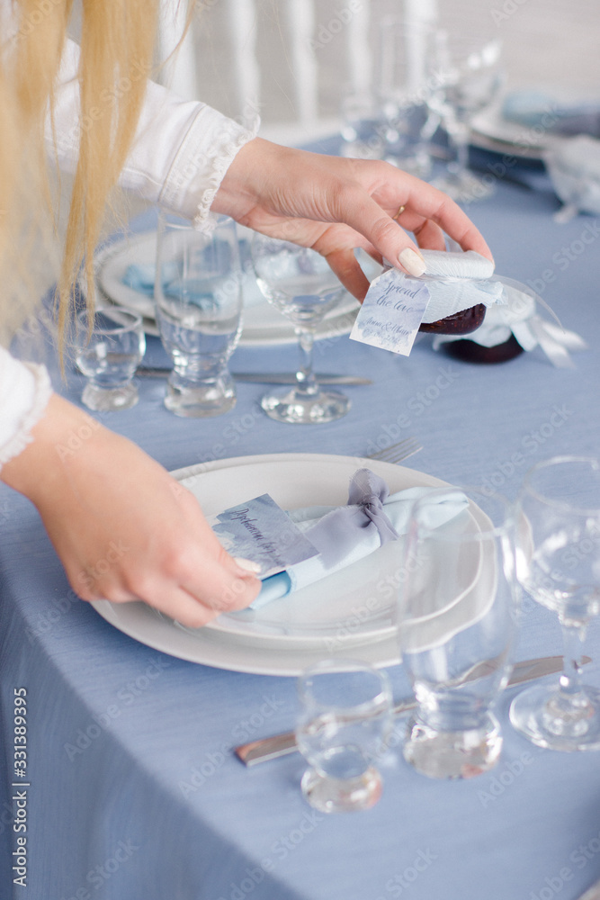 Decorator working at wedding table Decorator working at wedding table