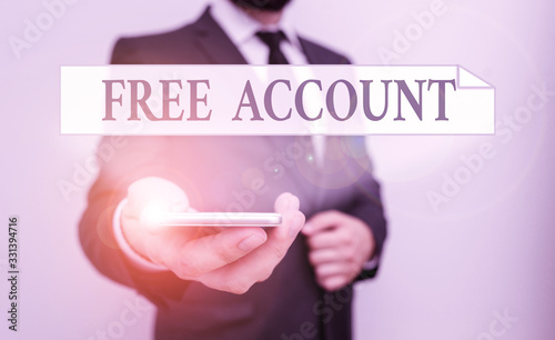 Text sign showing Free Account. Business photo showcasing signing up demonstratingal information or log in identity in a server Male human wear formal work suit hold smart hi tech smartphone use one