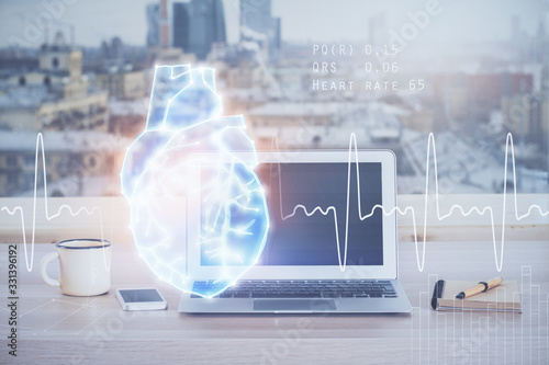 Desktop computer background and heart drawing. Double exposure. Medical study and healthcare concept.