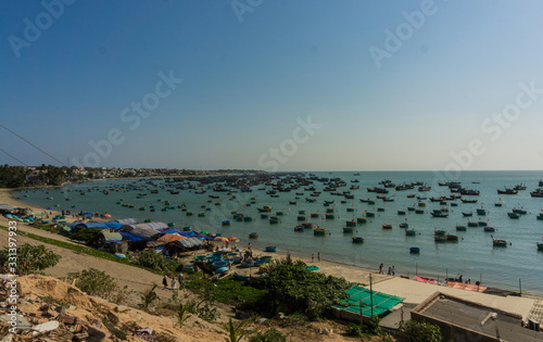 Fisherman village, Mui Ne, Vietnam, during a sunny day photo