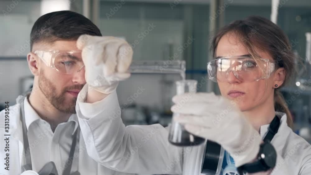 scientists are testing a soil sample in a lab scientists are testing a soil sample in a lab