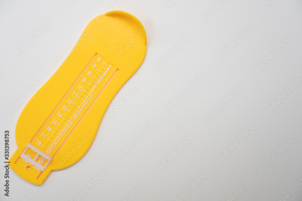 Foot Measurement on white background. Concept for shoe size and foot fitting . Foot Measurement on white background. Concept for shoe size and foot fitting .