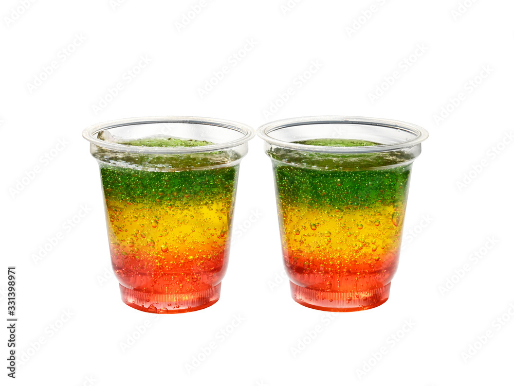 Multicolored jelly in cups isolated on a white background Multicolored jelly in cups isolated on a white background