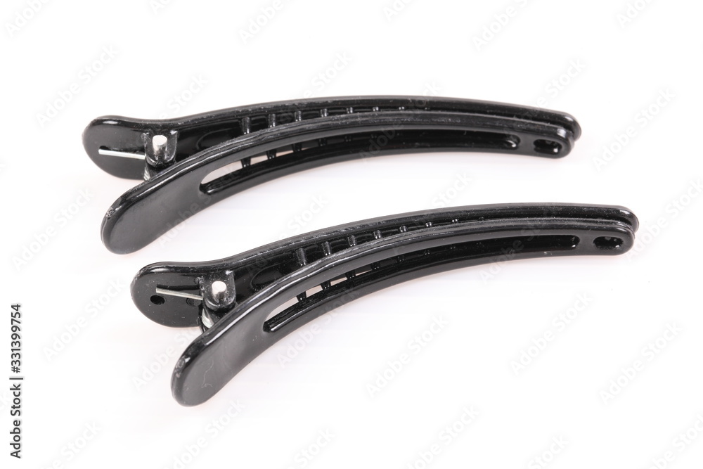 Obraz premium A pair of hair clips isolated on the white background