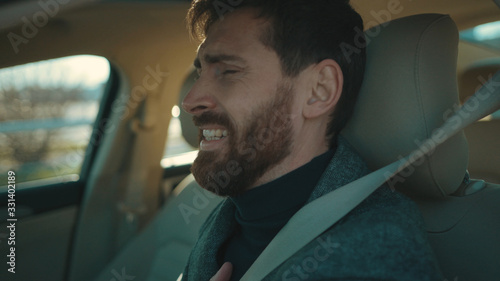 Foto Face man in the car coughs sneeze wearing Protective Face Mask COVID-19 coronavi