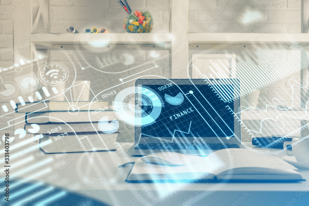 Computer on desktop in office with technology theme hologram. Multi exposure. Tech concept. Computer on desktop in office with technology theme hologram. Multi exposure. Tech concept.