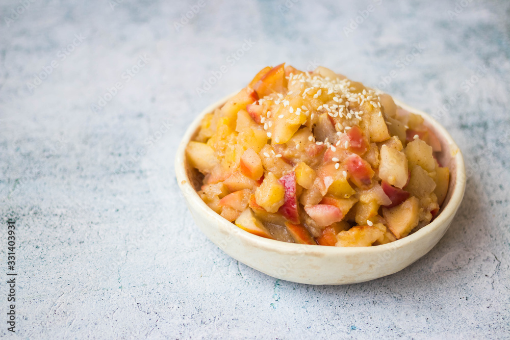 Cooked or baked apples and bananas sweet dessert, no sugar. Vegan, vegetarian healthy eating diet Cooked or baked apples and bananas sweet dessert, no sugar. Vegan, vegetarian healthy eating diet