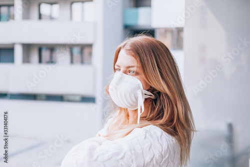 young woman wearing a face mask FFP3