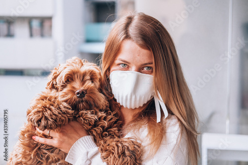 young woman wearing a face mask FFP3 photo