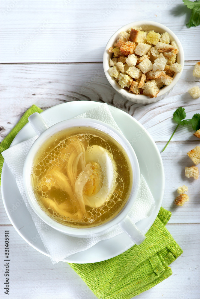 chicken broth with egg and crackers chicken broth with egg and crackers