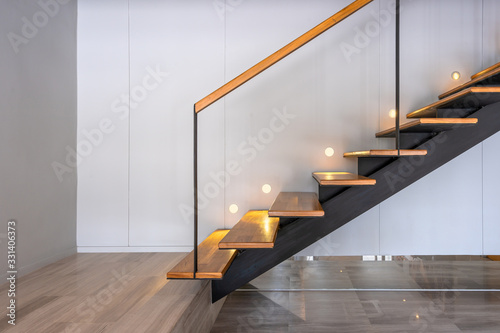 Stairway lights bulb for illumination as safety protection wooden stairs architecture interior design, Modern house building photo