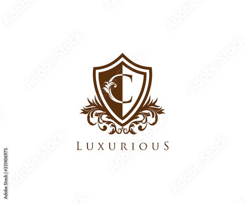 Vintage Letter C Logo. Shield C Letter Design Vector with shield shaper and Floral Hand Drawn.
