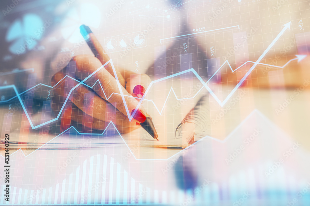 Double exposure of woman's hands making notes with forex graph hologram. Concept stock market analysis. Double exposure of woman's hands making notes with forex graph hologram. Concept stock market analysis.