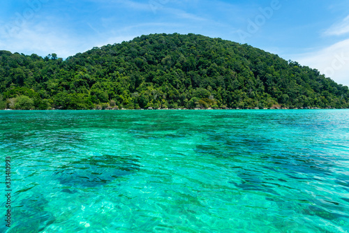 View of "Surin national island" in Andaman ocean at Southern of Thailand, very beautiful clearly turquoise water and absolutely coral reef. Travel destination for summer vacation photo.