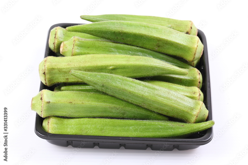 Fresh raw okra isolated on white background Fresh raw okra isolated on white background