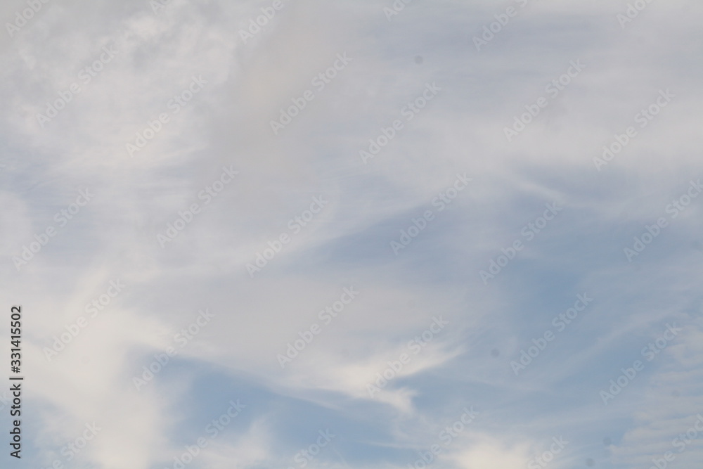 white clouds against a blue sky white clouds against a blue sky
