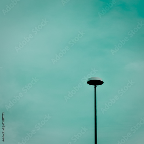 lamp on blue sky © Suleyman Karakurt