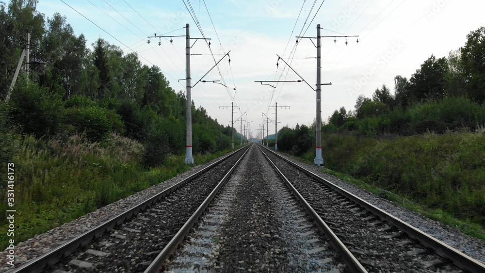 View from the train cabin on railway ride on the train forward.