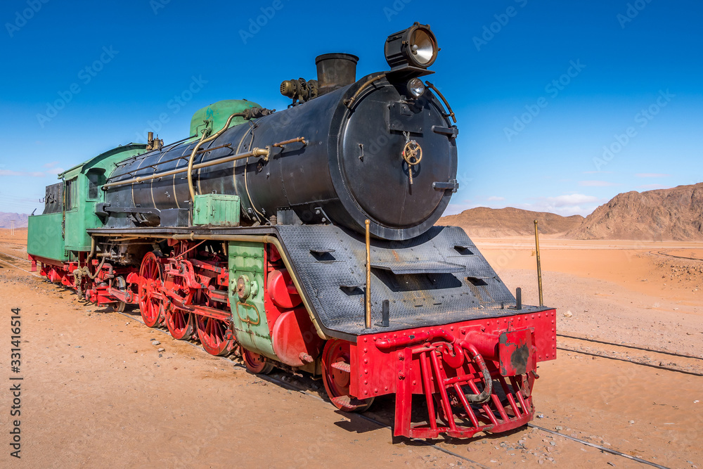 Naklejka premium Old abandoned locomotive in Wadi Ram.Jordan, Wadi Ram.January, 31, 2020