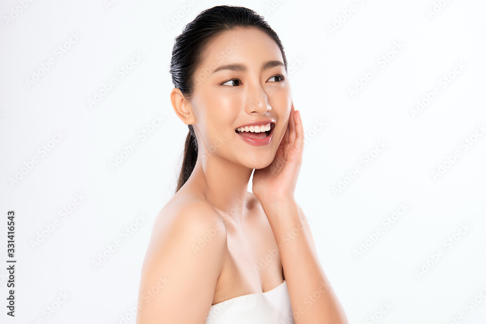 Beautiful Young Asian Woman with Clean Fresh Skin. Face care, Facial treatment, Cosmetology, beauty and healthy skin and cosmetic concept .woman beauty skin isolated on white background Beautiful Young Asian Woman with Clean Fresh Skin. Face care, Facial treatment, Cosmetology, beauty and healthy skin and cosmetic concept .woman beauty skin isolated on white background
