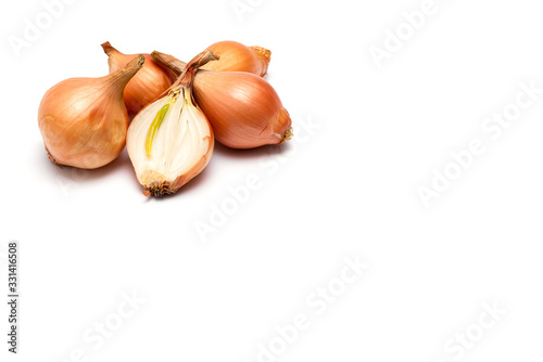 fresh bulbs of onion on a white background