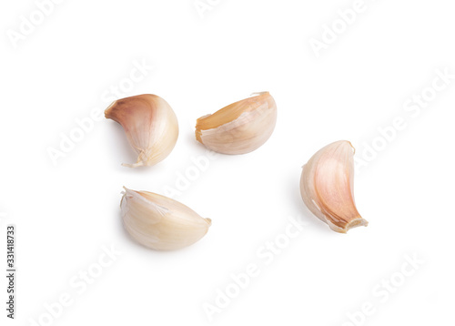 4 cloves garlic isolated on the white background