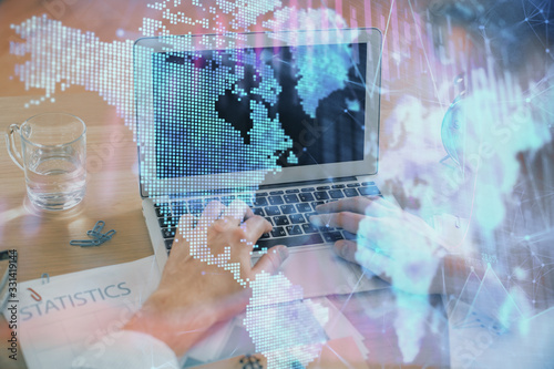 Wallpaper Mural Multi exposure of market chart with man working on computer on background. Concept of financial analysis. Torontodigital.ca
