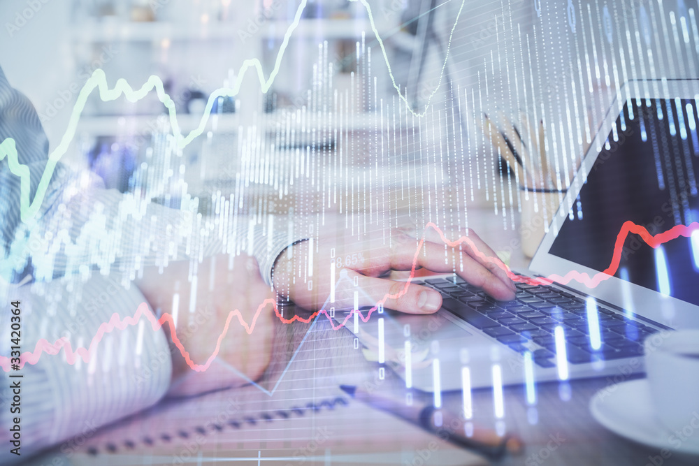 Multi exposure of stock market chart with man working on computer on background. Concept of financial analysis. Multi exposure of stock market chart with man working on computer on background. Concept of financial analysis.