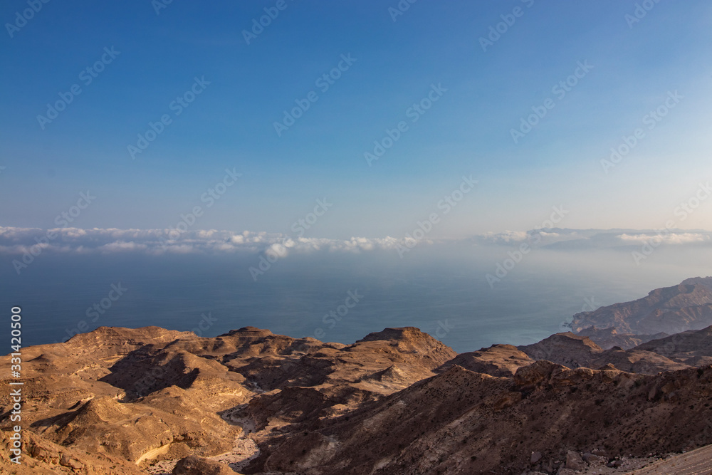 view through Canyon to the ocean along the coastal road to Salalah in Oman