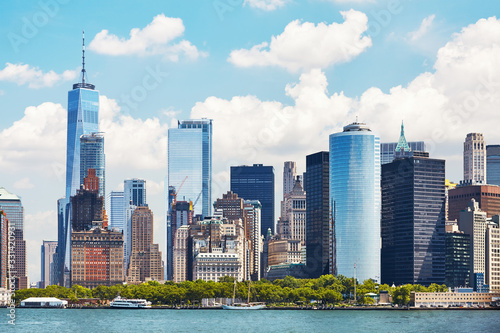 New York City skyline on a beautiful sunny day, color toning applied, USA.