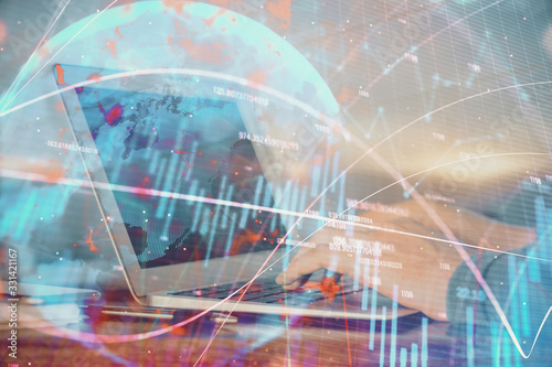 Wallpaper Mural Double exposure of stock market graph with man working on laptop on background. Concept of financial analysis. Torontodigital.ca