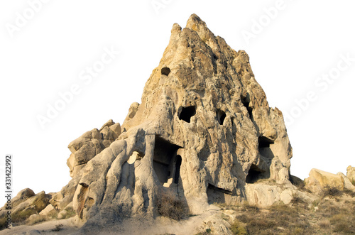 Yellow sand rock with caves as a concept of a bad tooth with cavities isolated