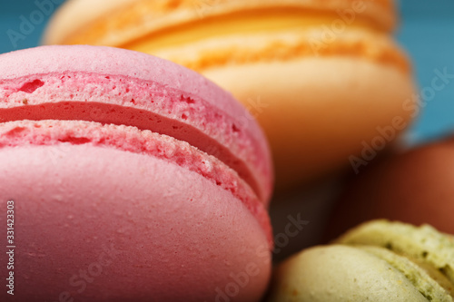 Macaron cookies with different color filling close-up, macro.
