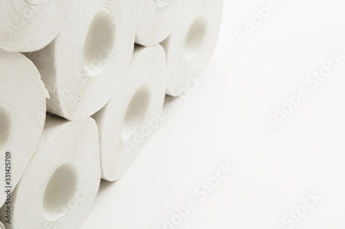Wall of toilet paper rolls with copy space. Quarantine shopping concept