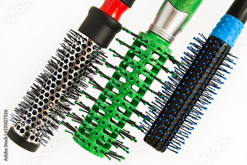 Round comb for styling and curling hair.