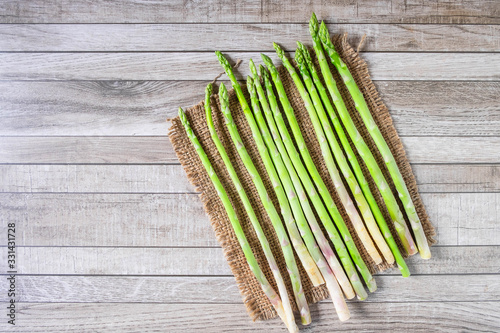 Fresh asparagus On a wooden background