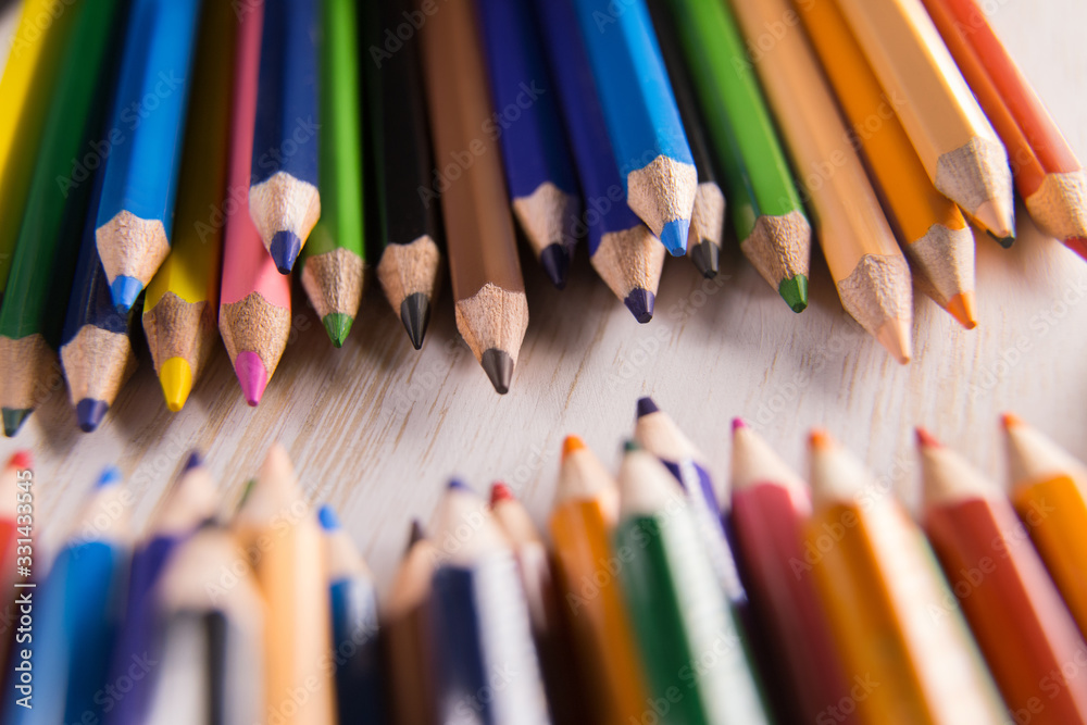 Many colored pencils lie on the table Many colored pencils lie on the table