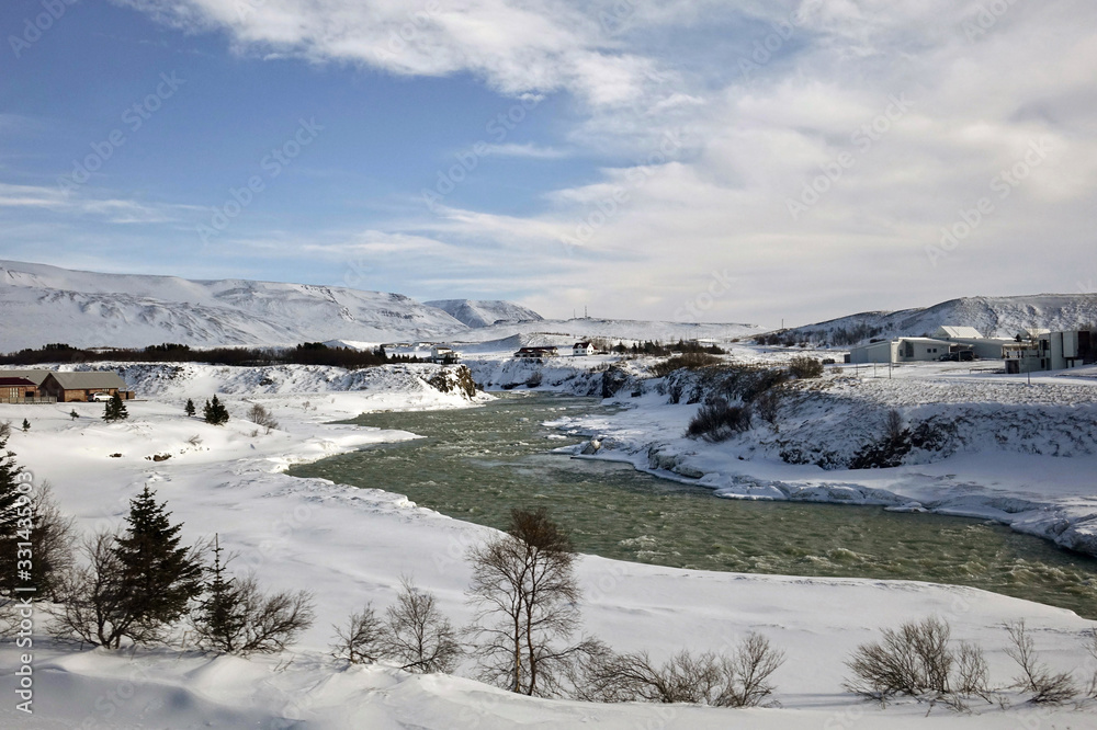 Iceland. Landscape with river in wintertime 