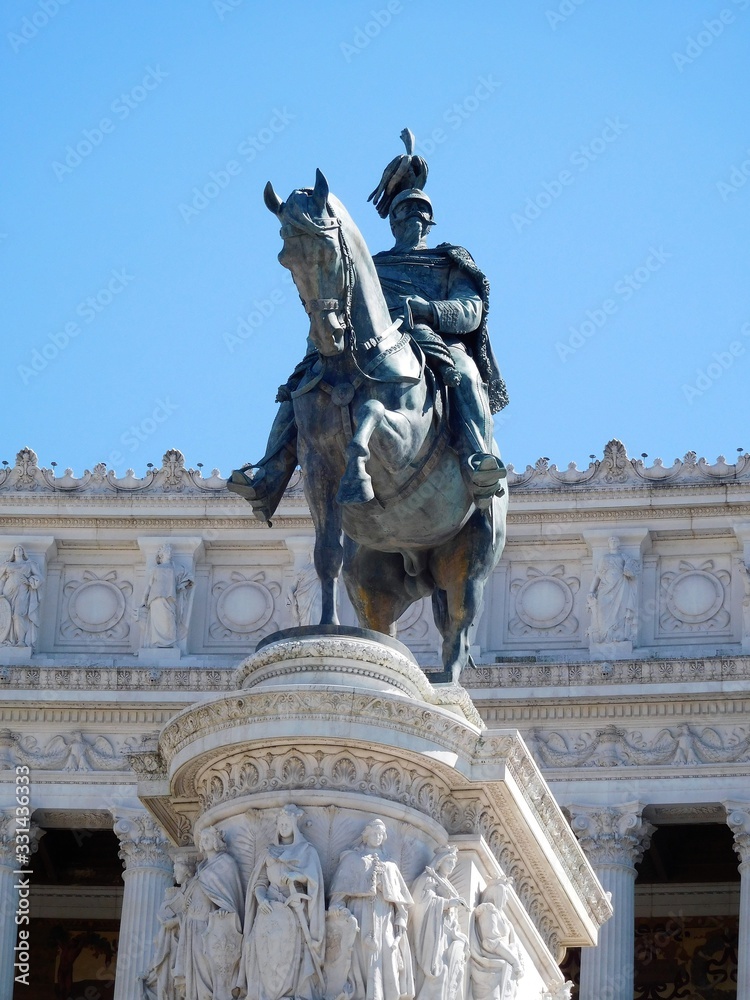 Statue in Rome, Italy against clear blue summer sky