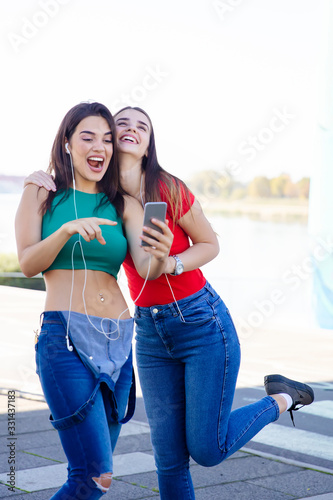 Young women outdoor against...