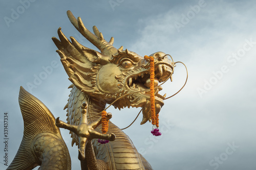Golden dragon statue during Chinese New Year in Phuket  Thailand