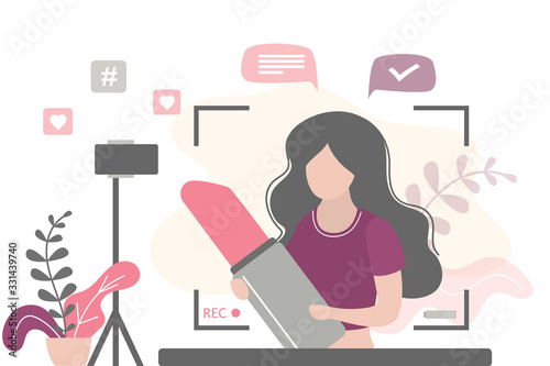 Female beauty blogger making review for cosmetics and recording video for her blog.