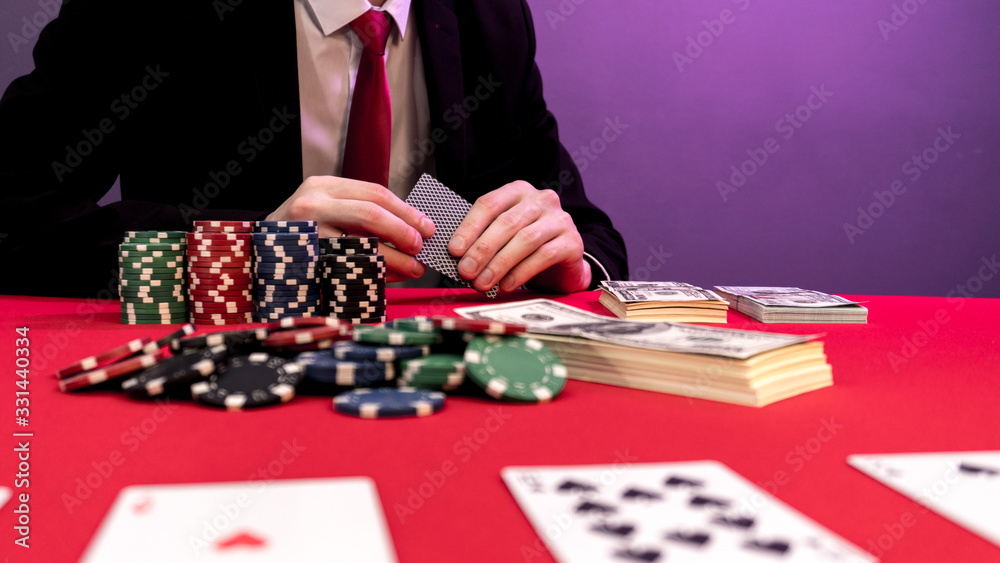 man is sitting at the poker table. poker game. man is sitting at the poker table. poker game.