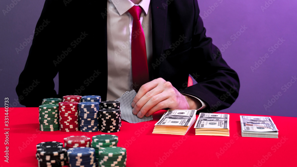 man is sitting at the poker table. poker game. man is sitting at the poker table. poker game.