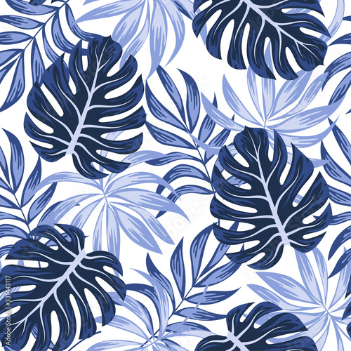 Abstract seamless tropical pattern with bright plants and leaves on a white background. Summer colorful hawaiian seamless pattern with tropical plants. Trendy summer Hawaii print.