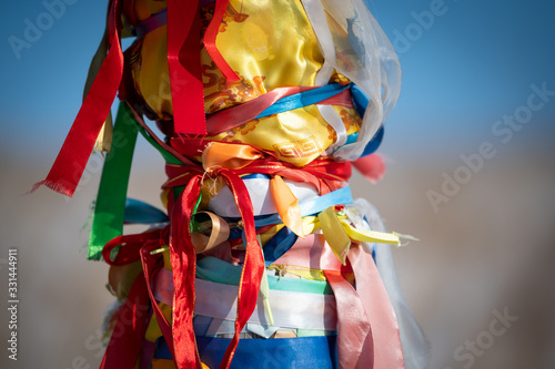 The Buddhist pray on sacred pillars photo