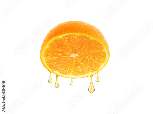 drops of juice falling from orange half isolated on white background