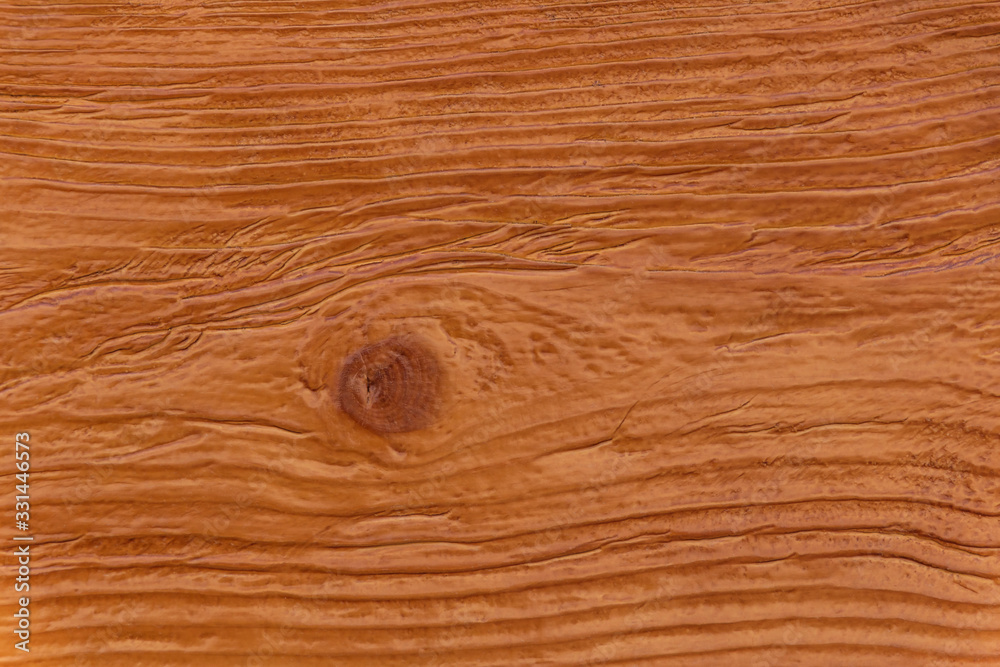 Naklejka premium close up of brown lacquered wooden board